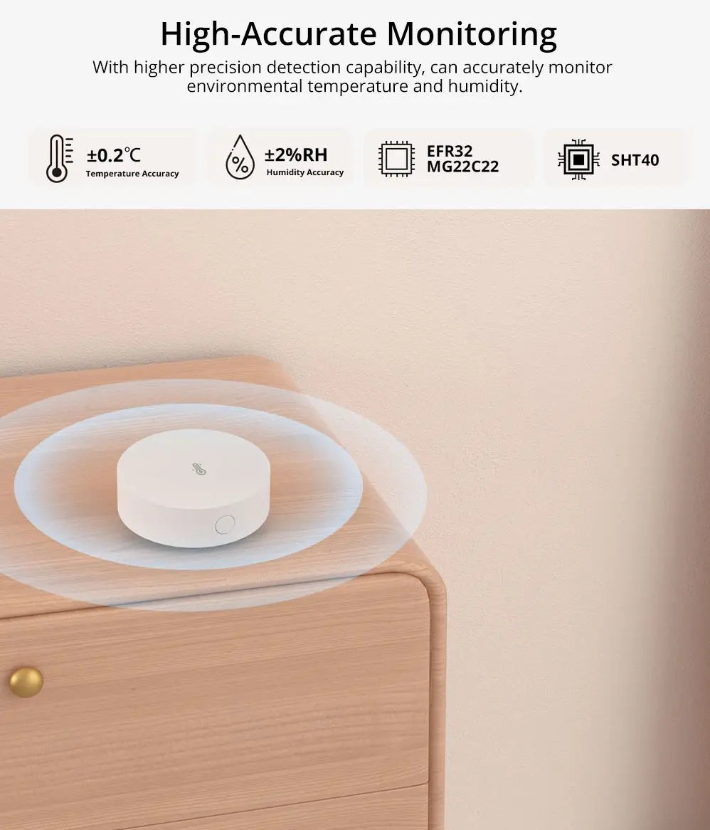 Capteur SONOFF SNZB-02P posé sur un meuble en bois